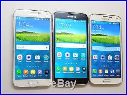 Lot of 3 Samsung Galaxy S5 T-Mobile SM-G900T Smartphones Power On AS-IS GSM
